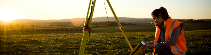 Land surveyor in rural area